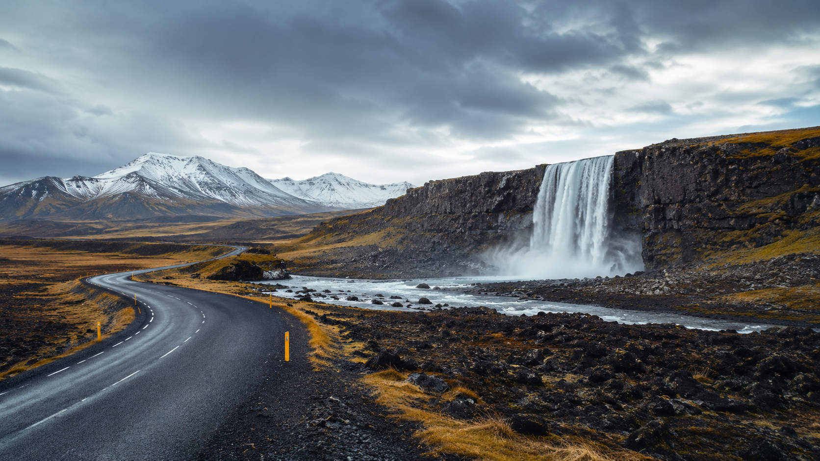 Road trip past an Icelandic waterfall